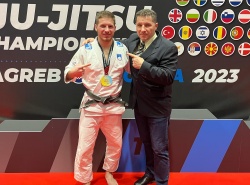 Tim Toplak in njegov trener Gorazd Toplak, zlato ju-jitsu borbe